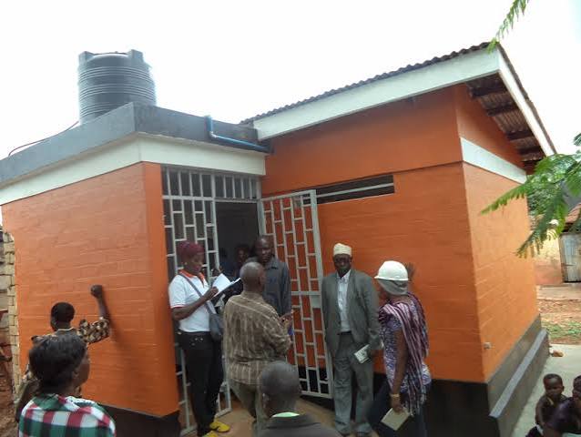 Newly built toilet block, ready for community use.